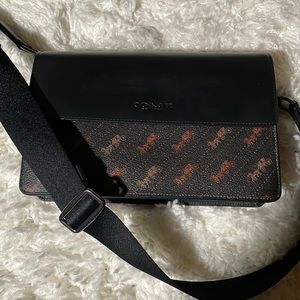 Authentic Coach Crossbody with wide adjustable nylon strap.